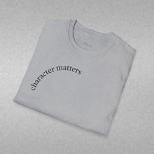 Load image into Gallery viewer, character matters Unisex T-Shirt by B E-Z