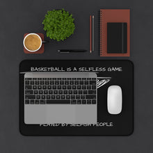 Load image into Gallery viewer, BASKETBALL IS A SELFLESS GAME PLAYED BY SELFISH PEOPLE Desk Mat (12&quot; x 18&quot;)
