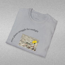 Load image into Gallery viewer, even plants struggle for sunlight Unisex T-Shirt by B E-Z
