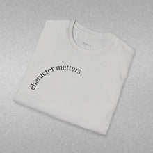 Load image into Gallery viewer, character matters Unisex T-Shirt by B E-Z
